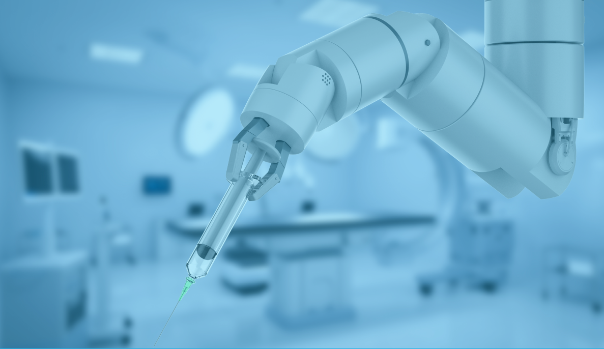Robotic arm in a factory setting, holding a syringe component, with a blurred background of lab equipment.
